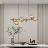 Valencia Långbordstaklampa 63cm Mässing/Amber-Lampconcept.se